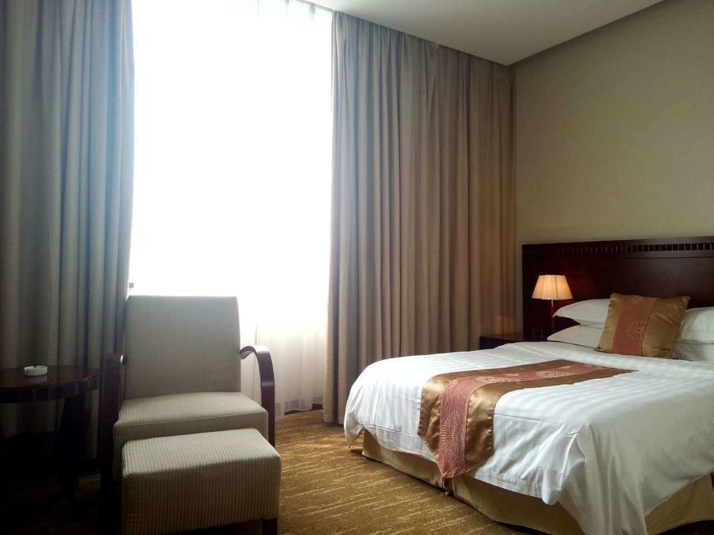 Century Hotel Taicang Room photo